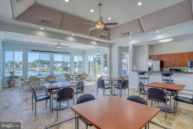a group of people sitting outside of a building