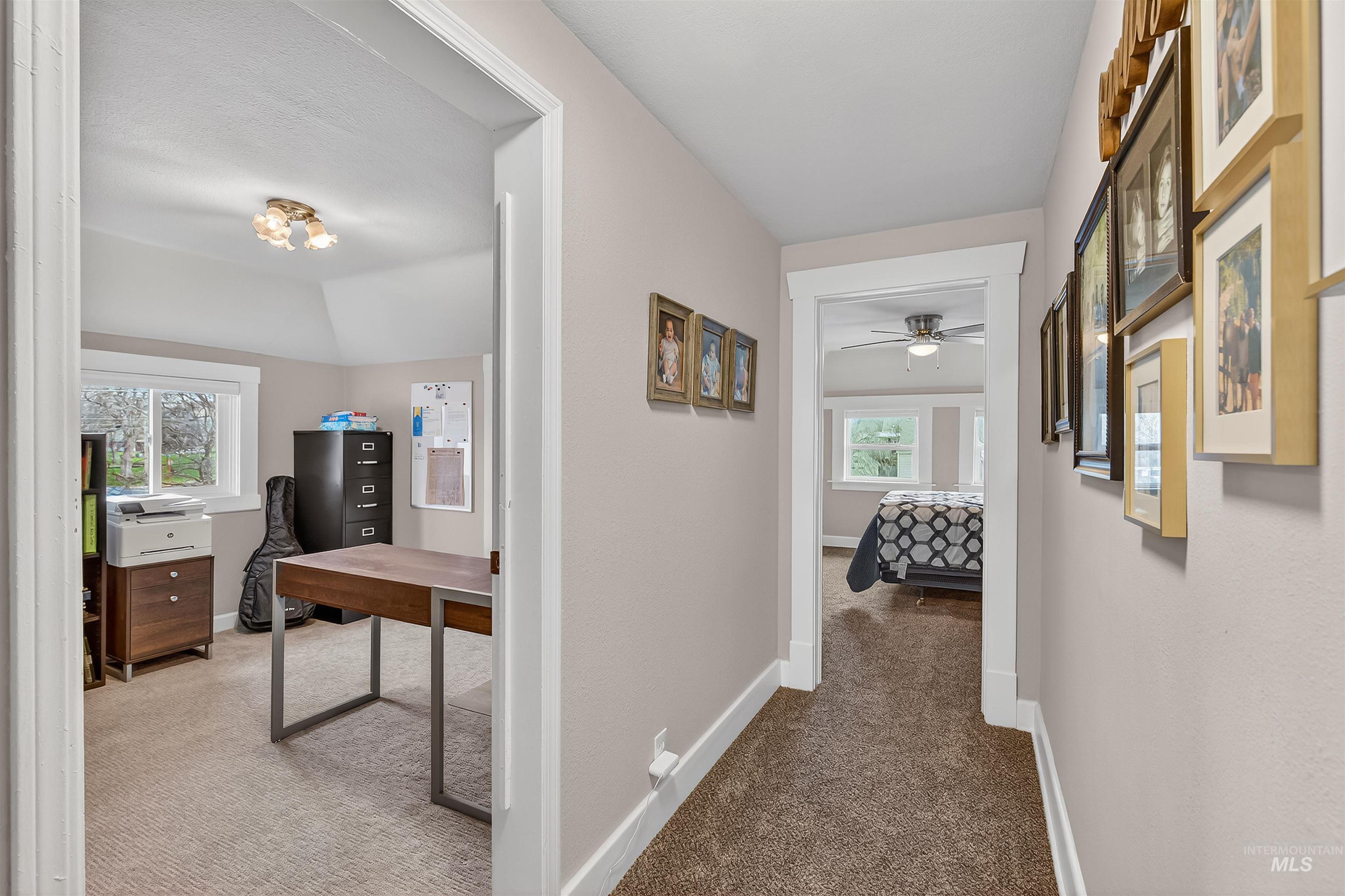 716 Chestnut Street Clarkston, WA 99403 - Photo 28 of 49 Hallway with carpet floors and an office area
