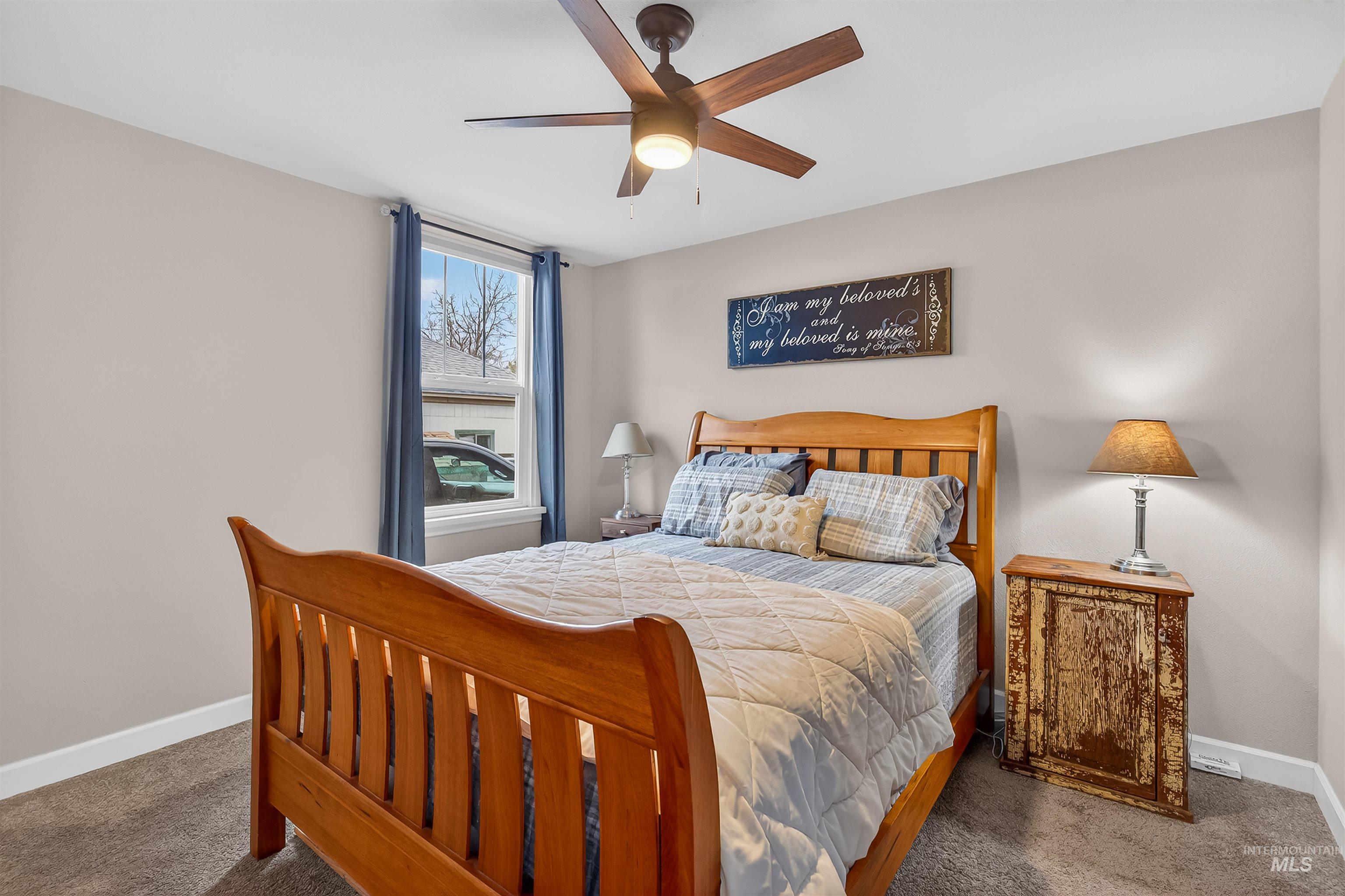 716 Chestnut Street Clarkston, WA 99403 - Photo 31 of 49 Carpeted bedroom with baseboards and ceiling fan