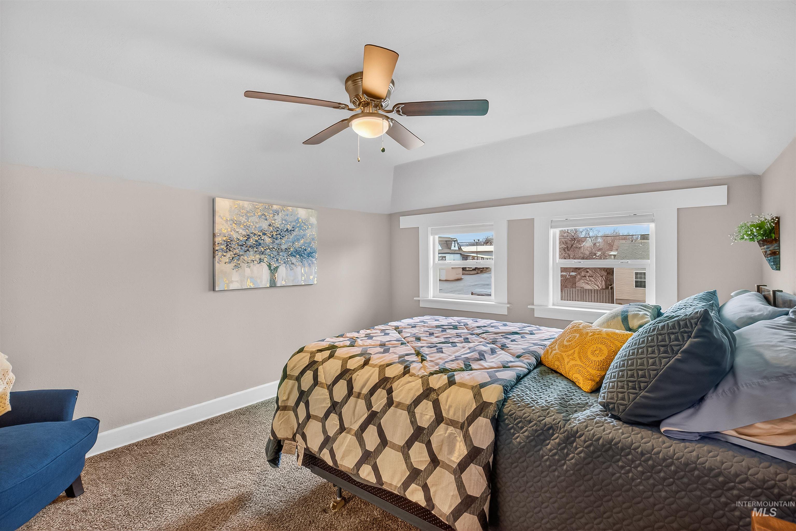 716 Chestnut Street Clarkston, WA 99403 - Photo 32 of 49 Bedroom featuring lofted ceiling, carpet, and ceiling fan