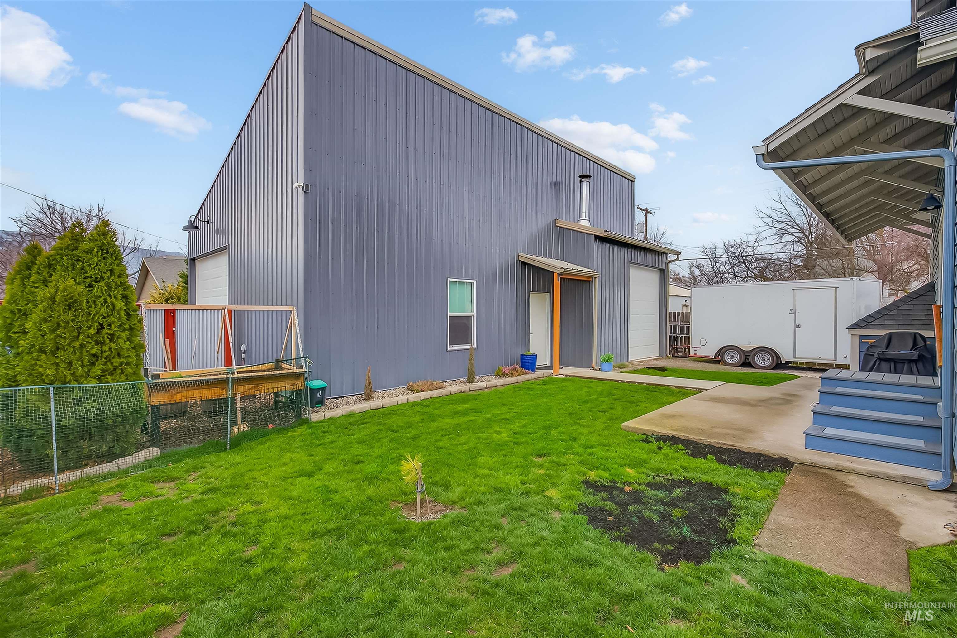 716 Chestnut Street Clarkston, WA 99403 - Photo 44 of 49 Back of house with an outbuilding
