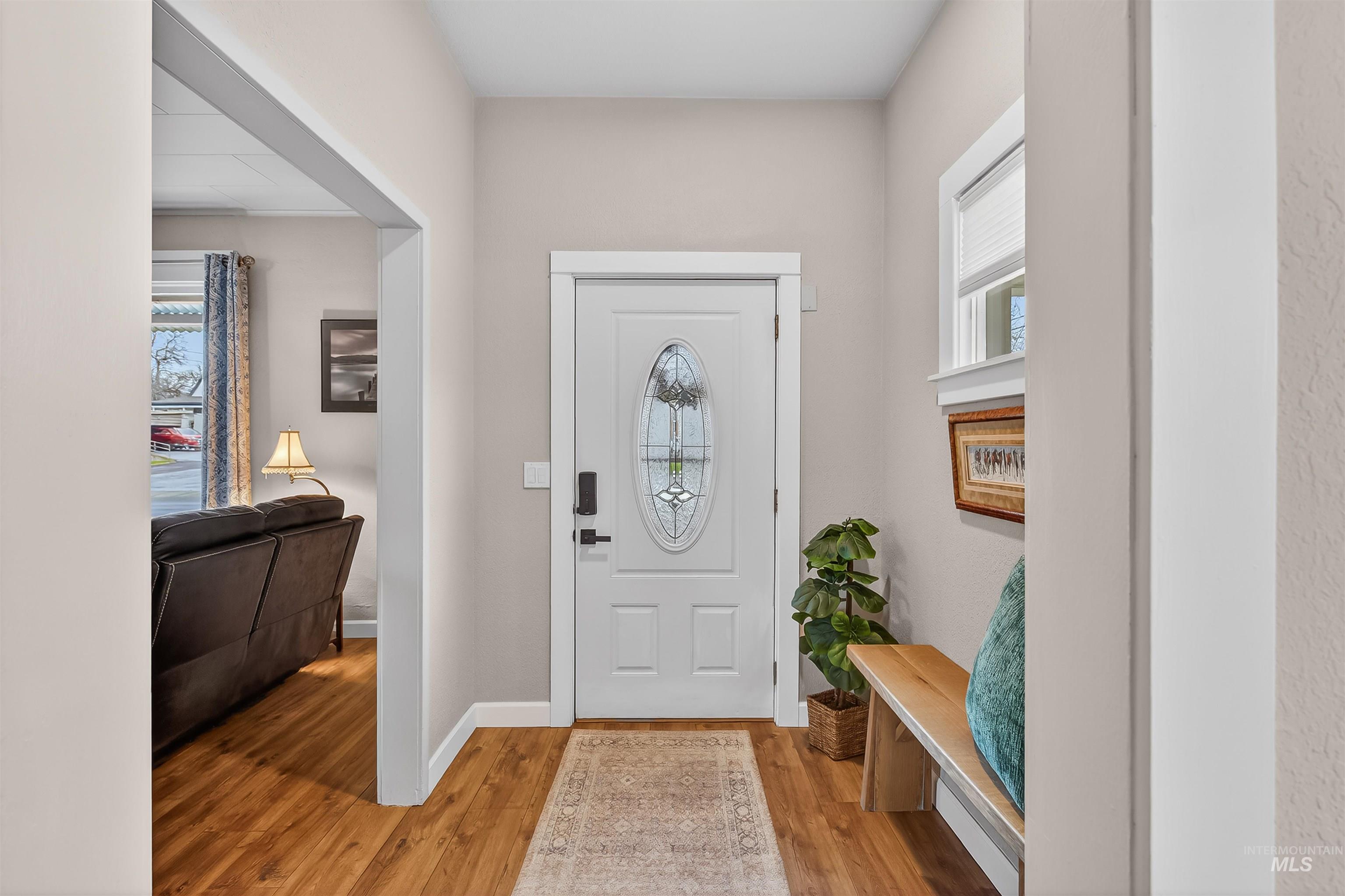 716 Chestnut Street Clarkston, WA 99403 - Photo 5 of 49 Entryway with light wood-style floors and baseboards
