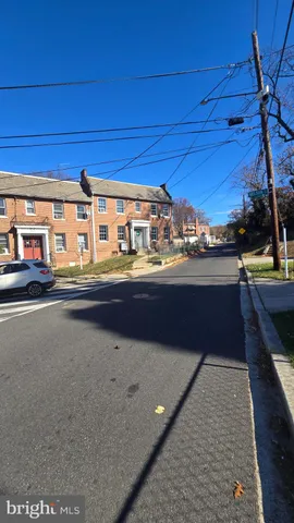 a kitchen with stainless steel appliances wooden cabinets and a counter top space