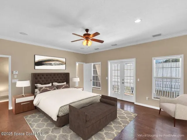 a bedroom with a large bed and a window