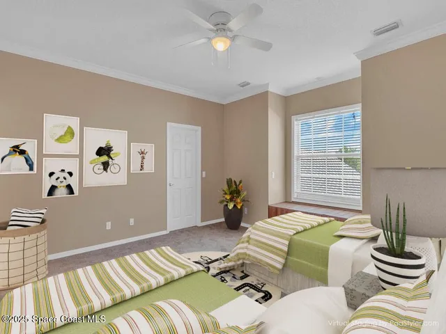 a bedroom with a bed and ceiling fan