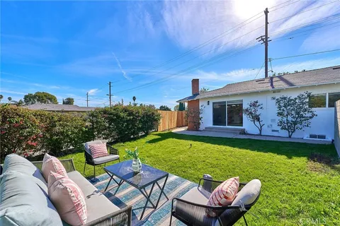 a view of a patio with furniture