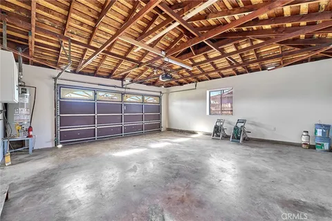 a view of a room with wooden walls