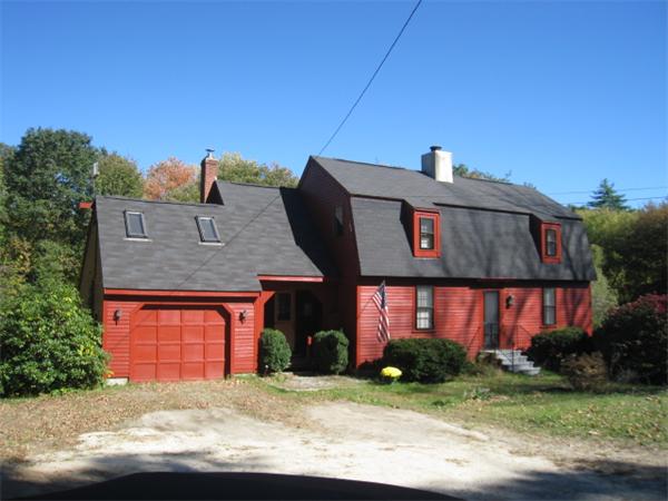 29 Wheeler Road Bolton, MA 01740 - Photo 1 of 1 a front view of a house with a yard