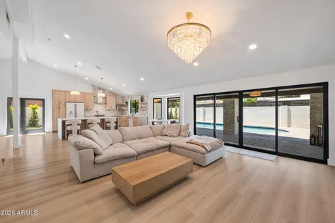 a spacious bathroom with a double vanity sink and a mirror