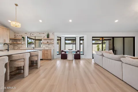 a bedroom with a bed and a couch