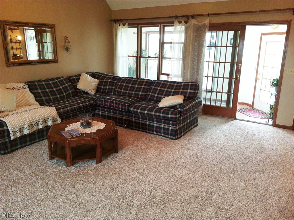 42156 Biggs Road Lagrange, OH 44050 - Photo 9 of 35 Great room showing access and location of private four seasons outdoor viewing room