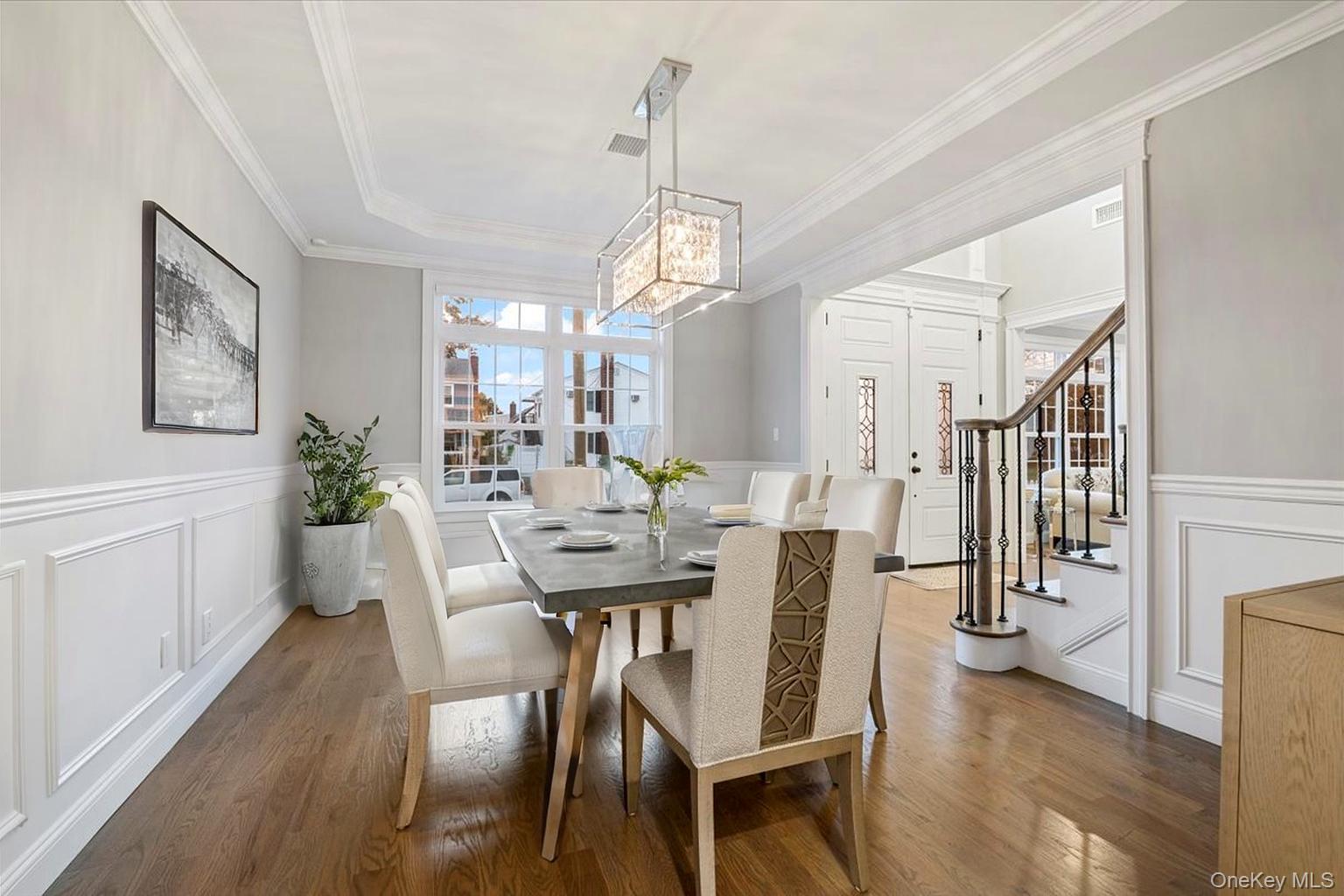 1427 Bellmore Road North Bellmore, NY 11710 - Photo 11 of 38 a view of a dining room with furniture window and wooden floor