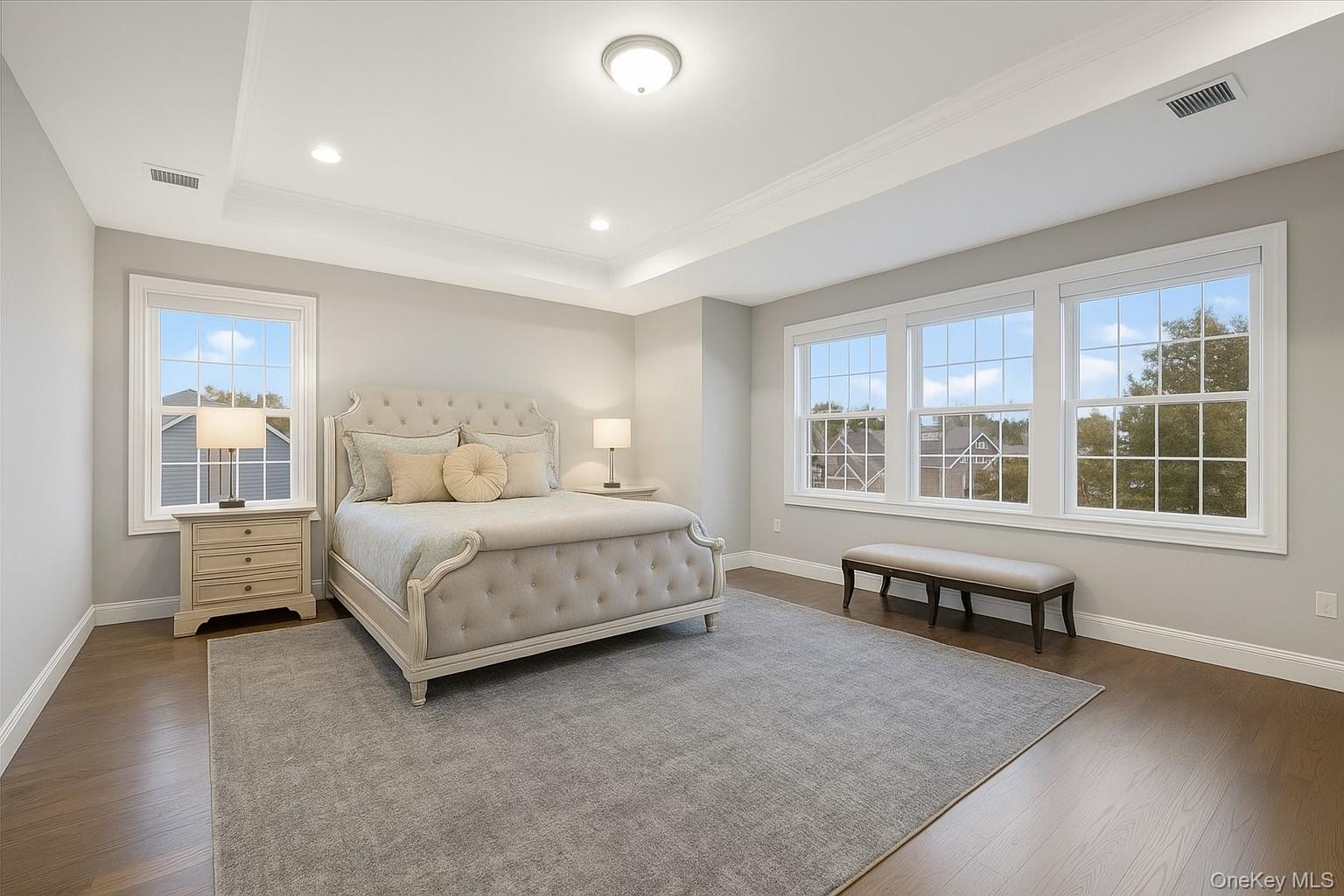 1427 Bellmore Road North Bellmore, NY 11710 - Photo 23 of 38 a bedroom with a bed and a large window