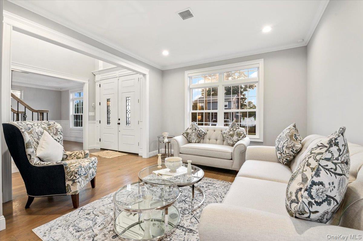 1427 Bellmore Road North Bellmore, NY 11710 - Photo 8 of 38 a living room with furniture and a large window