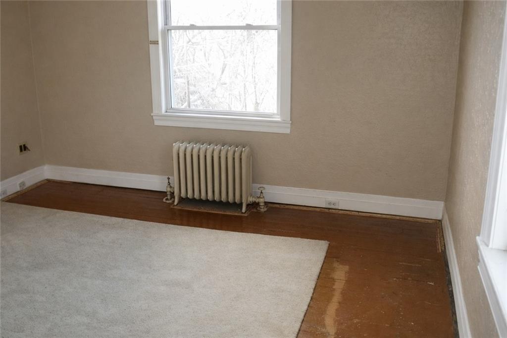 624 Kier Road Salina, PA 15680 - Photo 12 of 19 an empty room with wooden floor and windows
