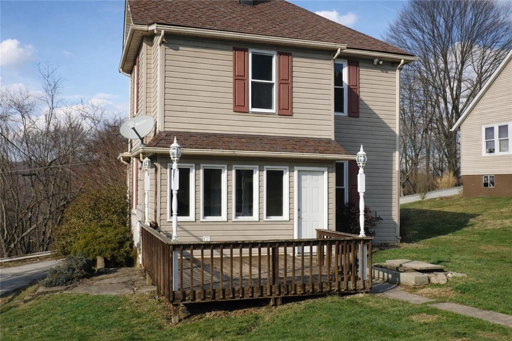 624 Kier Road Salina, PA 15680 - Photo 19 of 19 a view of a house with backyard and a garden