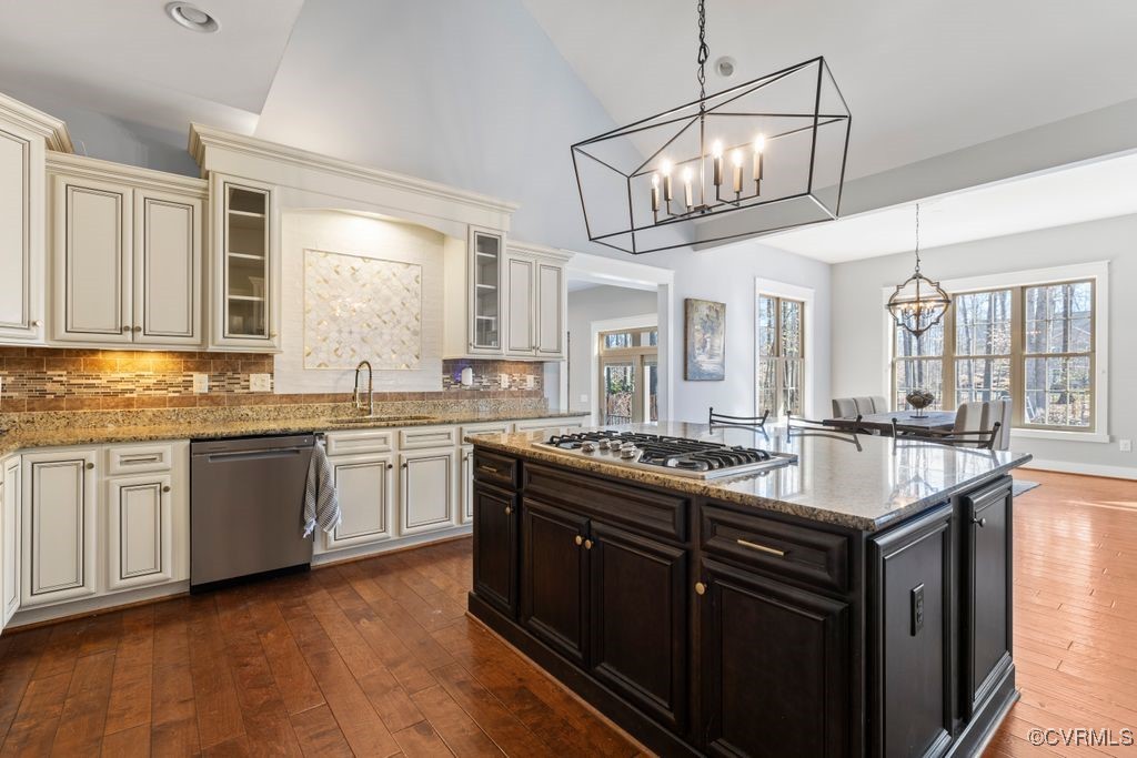 14106 Old Fort Drive Midlothian, VA 23113 - Photo 11 of 47 a kitchen with granite countertop stove sink and cabinets