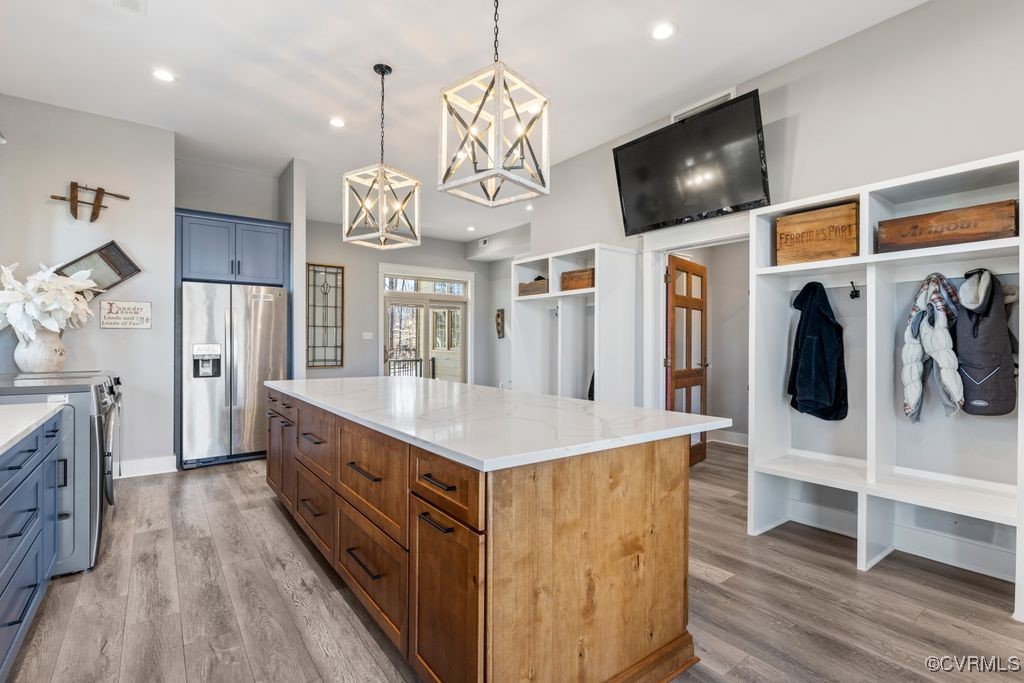 14106 Old Fort Drive Midlothian, VA 23113 - Photo 15 of 47 a kitchen with stainless steel appliances a stove top oven a refrigerator a sink and dishwasher