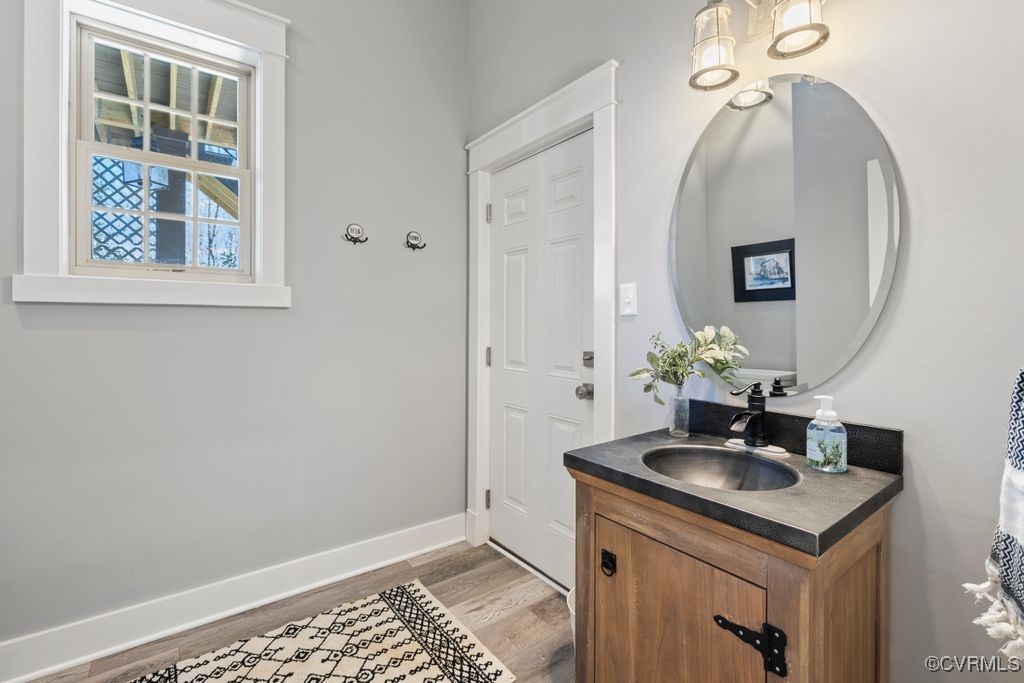 14106 Old Fort Drive Midlothian, VA 23113 - Photo 17 of 47 a bathroom with a sink and a mirror
