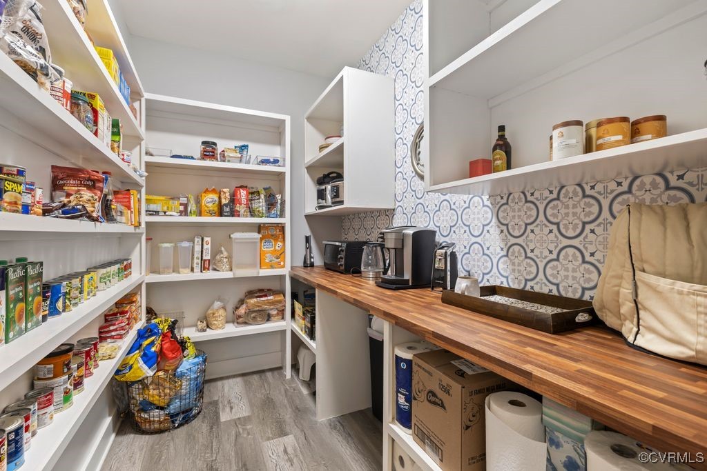 14106 Old Fort Drive Midlothian, VA 23113 - Photo 18 of 47 a utility room with stainless steel appliances wooden floor and shelf