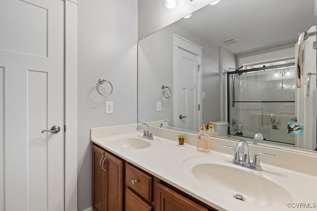 14106 Old Fort Drive Midlothian, VA 23113 - Photo 29 of 47 a bathroom with a sink double vanity and shower