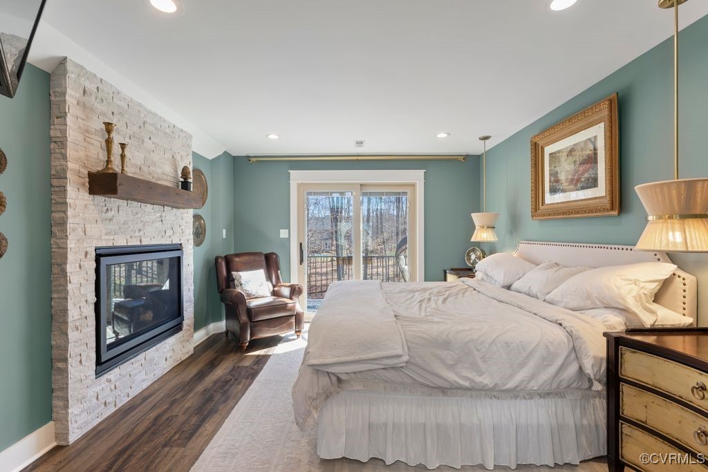 14106 Old Fort Drive Midlothian, VA 23113 - Photo 32 of 47 a bedroom with a bed and a fireplace