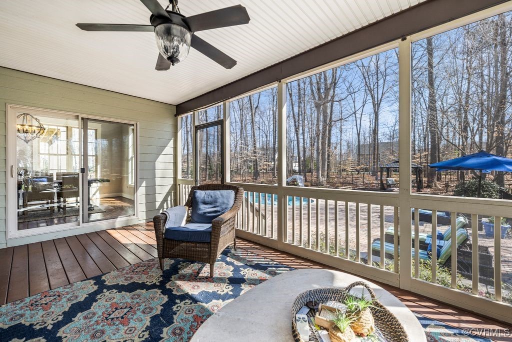 14106 Old Fort Drive Midlothian, VA 23113 - Photo 42 of 47 a living room with furniture and a floor to ceiling window