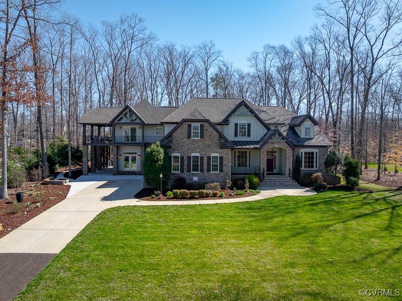 14106 Old Fort Drive Midlothian, VA 23113 - Photo 43 of 47 a front view of house with yard and green space