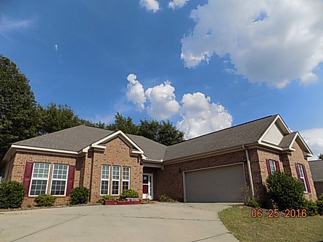 218 Timber Ridge Boulevard Byron, GA 31008 - Photo 1 of 30 front view of a house with a yard