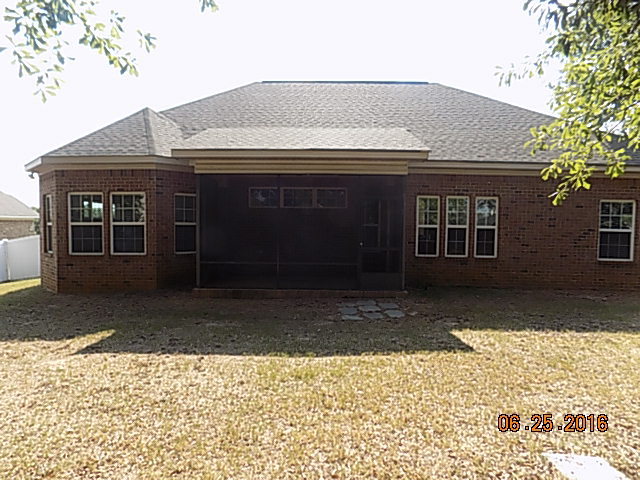 218 Timber Ridge Boulevard Byron, GA 31008 - Photo 3 of 30 a front view of a house with a yard and garage