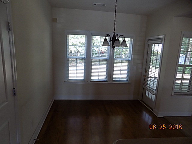 218 Timber Ridge Boulevard Byron, GA 31008 - Photo 8 of 30 a view of an empty room with wooden floor and a window