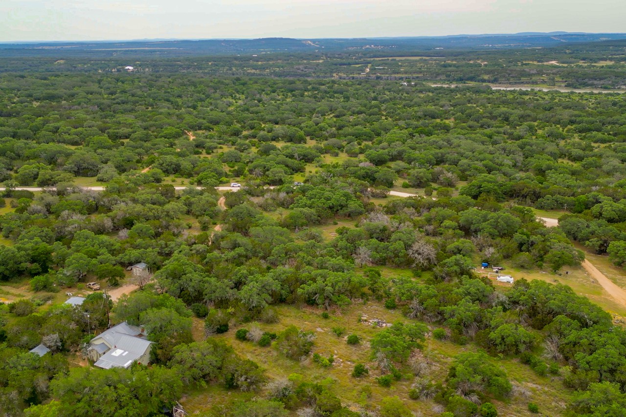 1365 Pedernales Hills Road Johnson City, TX 78636 - Photo 24 of 31 a view of a field with an outdoor space
