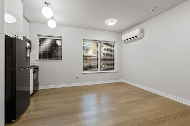 a view of a livingroom with furniture and a couch
