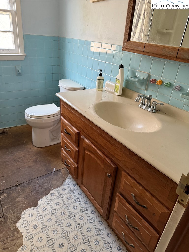 733 Clark Swift Road Vilas, NC 28692 - Photo 23 of 36 a bathroom with a sink and a toilet