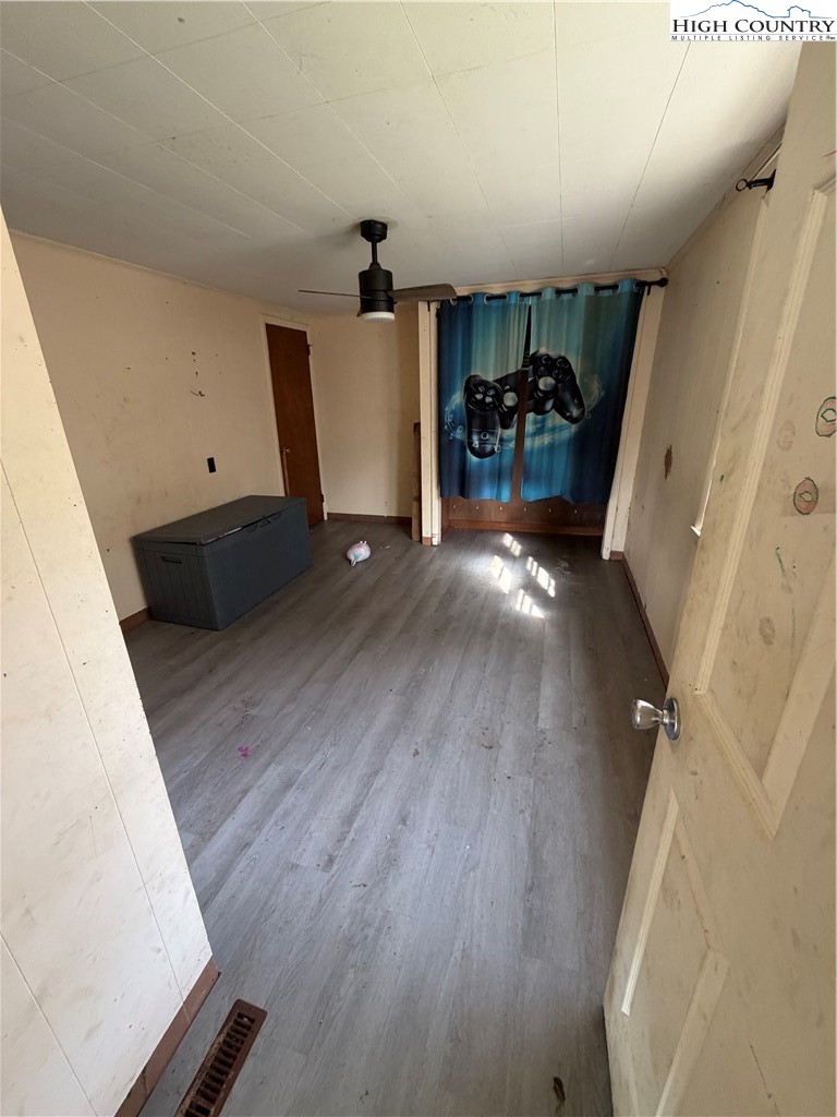 733 Clark Swift Road Vilas, NC 28692 - Photo 24 of 36 a view of a livingroom with furniture and window