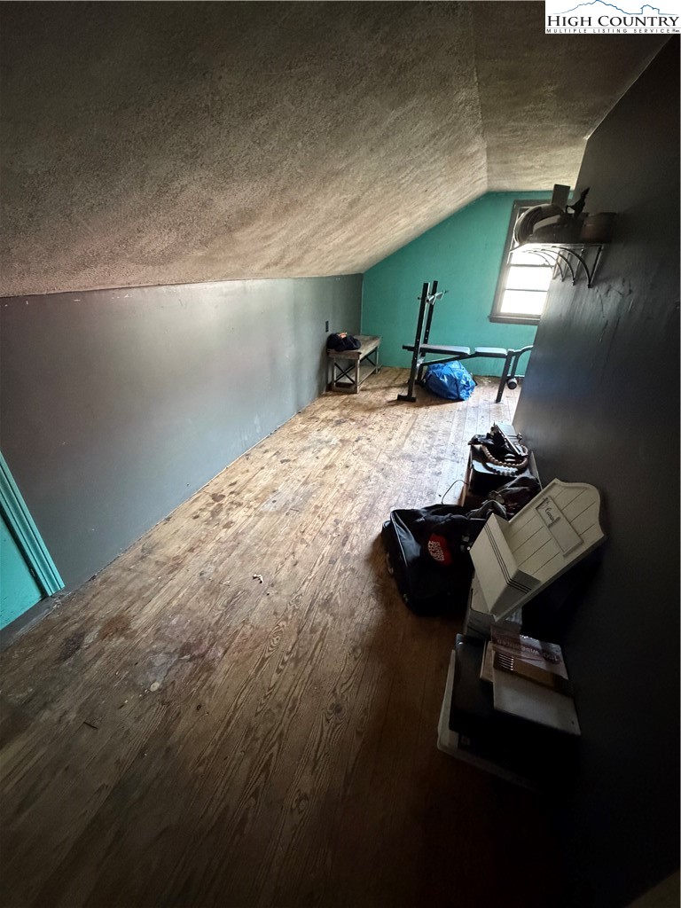 733 Clark Swift Road Vilas, NC 28692 - Photo 25 of 36 a room with furniture and a wooden floor