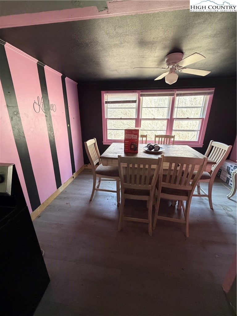 733 Clark Swift Road Vilas, NC 28692 - Photo 27 of 36 a view of a dining room with furniture and window