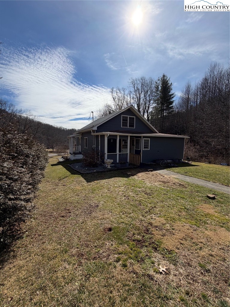 733 Clark Swift Road Vilas, NC 28692 - Photo 3 of 36 a view of a house with a yard