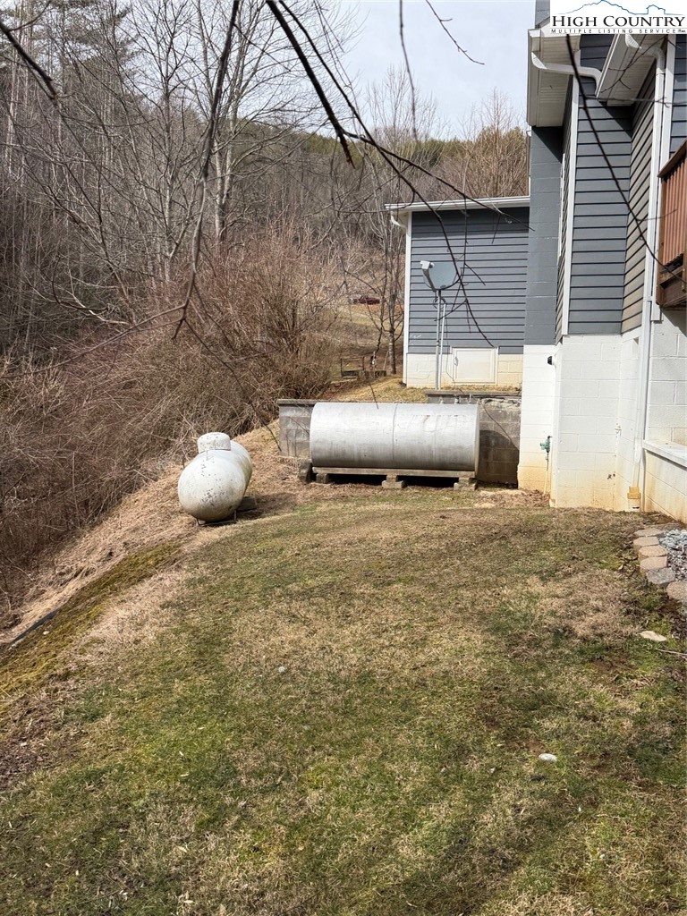 733 Clark Swift Road Vilas, NC 28692 - Photo 6 of 36 a front view of a house with a yard