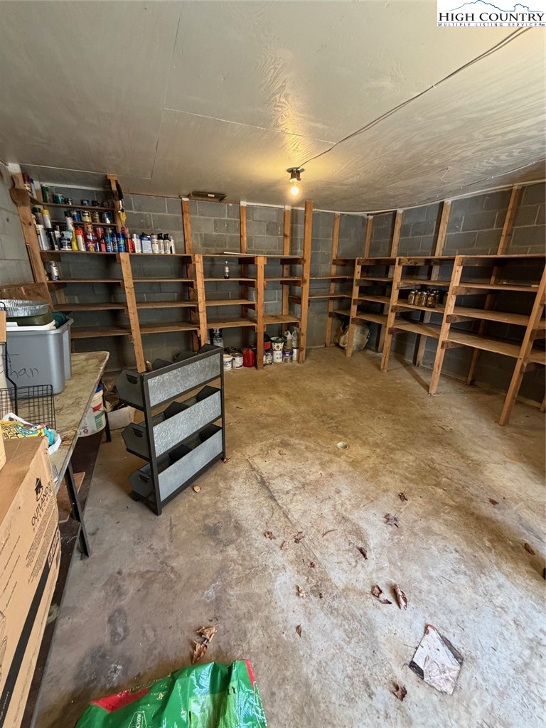 733 Clark Swift Road Vilas, NC 28692 - Photo 10 of 36 a view of an empty room with stairs