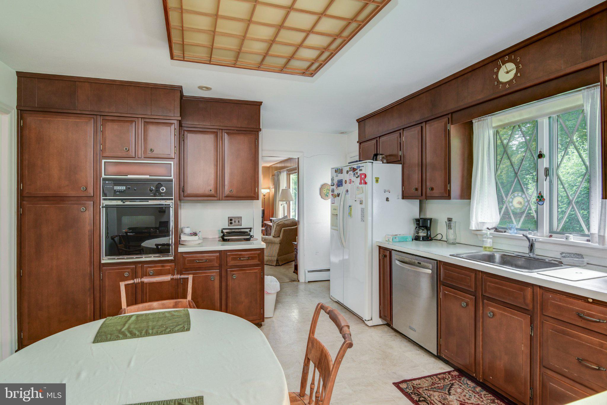 19 Crown Road Trenton, NJ 08638 - Photo 7 of 27 Charming kitchen with rich wood tones.