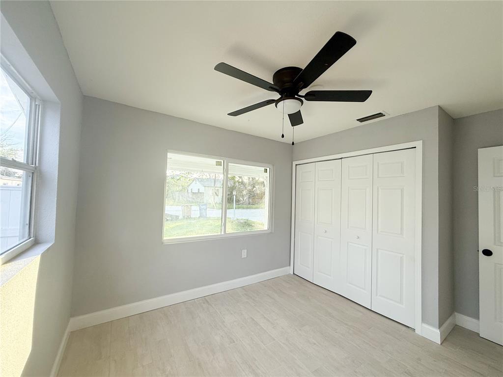 14000 Miramar Avenue, Unit A Madeira Beach, FL 33708 - Photo 13 of 20 a view of an empty room with a window