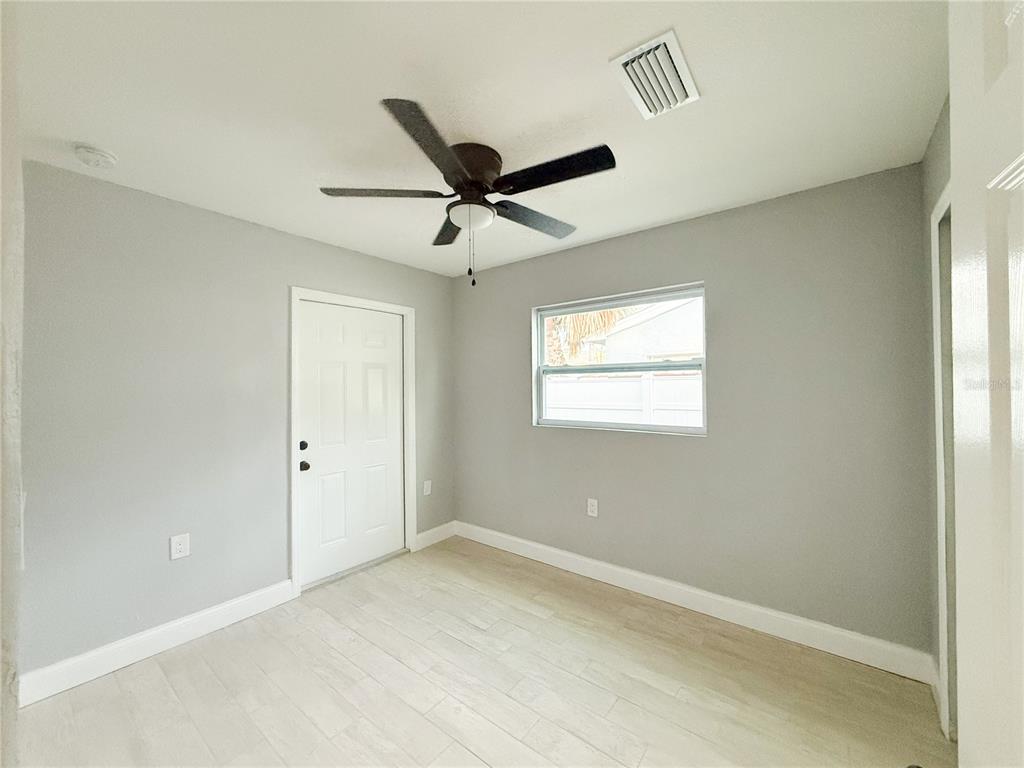 14000 Miramar Avenue, Unit A Madeira Beach, FL 33708 - Photo 17 of 20 a view of an empty room