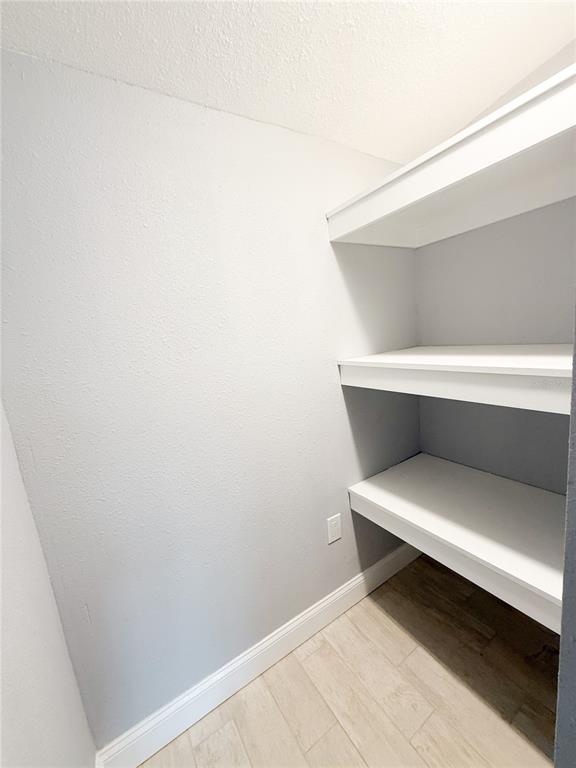 14000 Miramar Avenue, Unit A Madeira Beach, FL 33708 - Photo 20 of 20 a view of white door and chair in a room