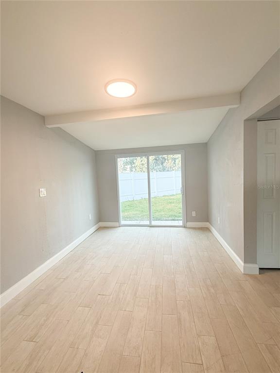 14000 Miramar Avenue, Unit A Madeira Beach, FL 33708 - Photo 7 of 20 a view of an empty room with a window