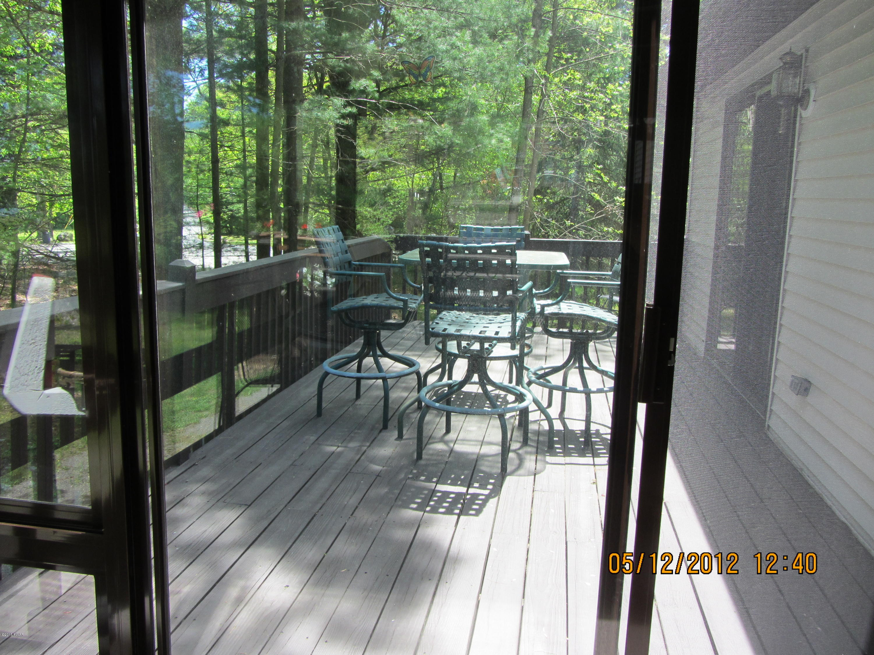 321 Silver Lake Road Dingmans Ferry, PA 18328 - Photo 10 of 42 View from 4 Season Room to Deck outside