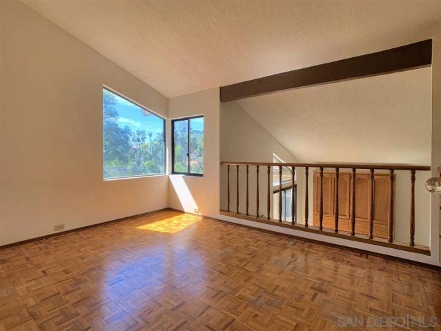 a view of a kitchen with cabinets
