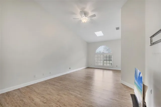 a view of a sink and cabinets