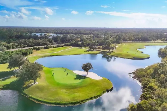 a view of a garden with an outdoor space and seating area