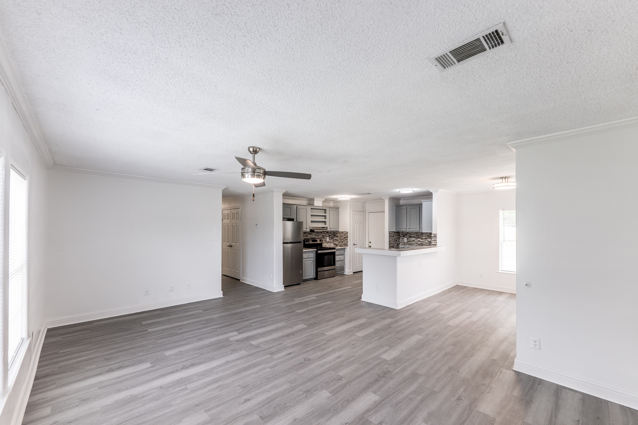 130 Varsity Drive Huntsville, TX 77340 - Photo 4 of 22 Photos show typical layout and finishes; actual unit may vary.